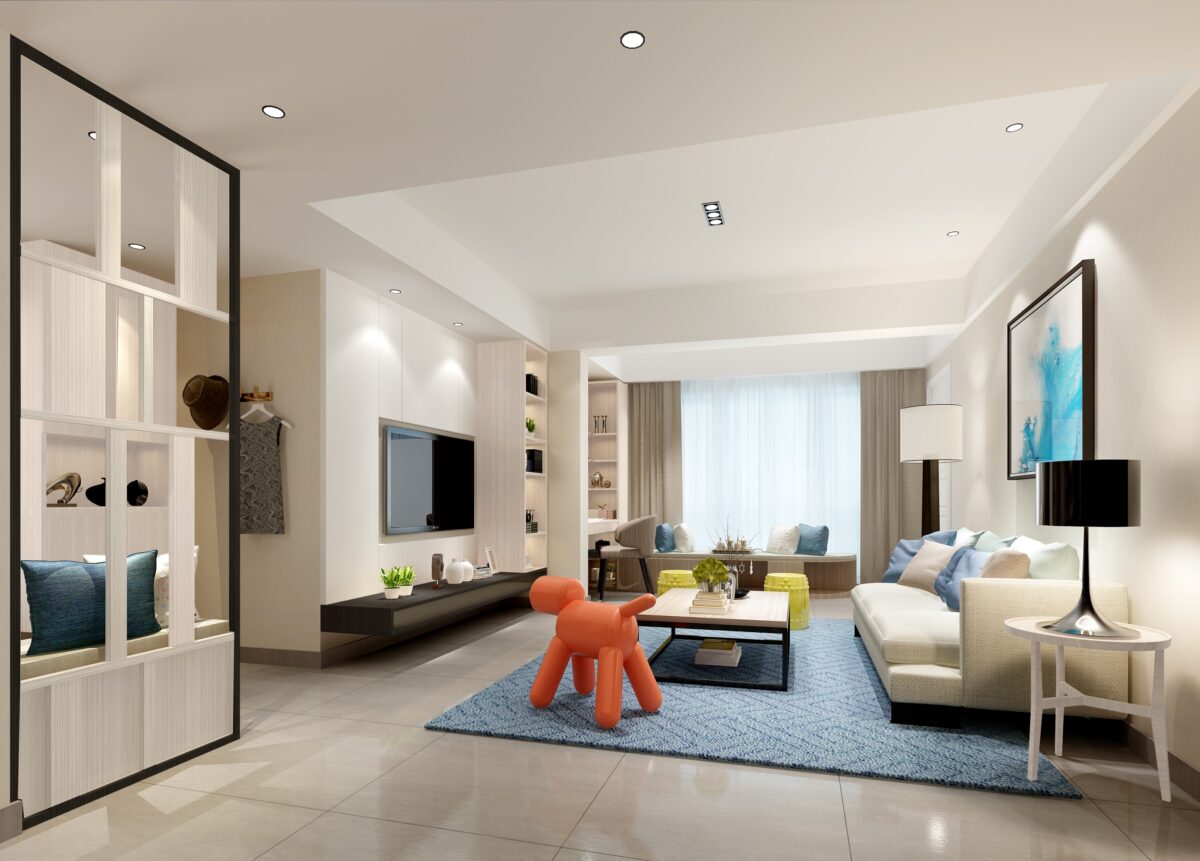 Modern living room featuring a pastel blue rug, neutral sectional sofa, vibrant orange decor, and open shelving.
