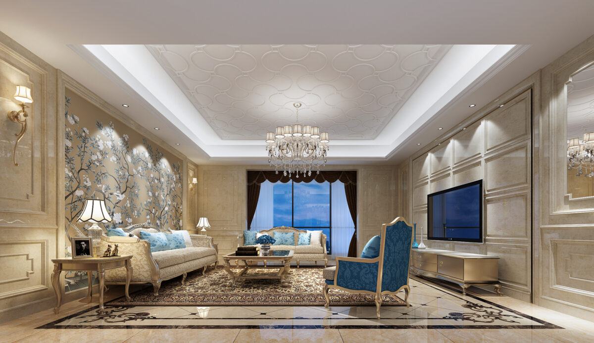 Classic European-style luxury living room with plush gold and blue furniture, crystal chandelier, and floral wall accents.