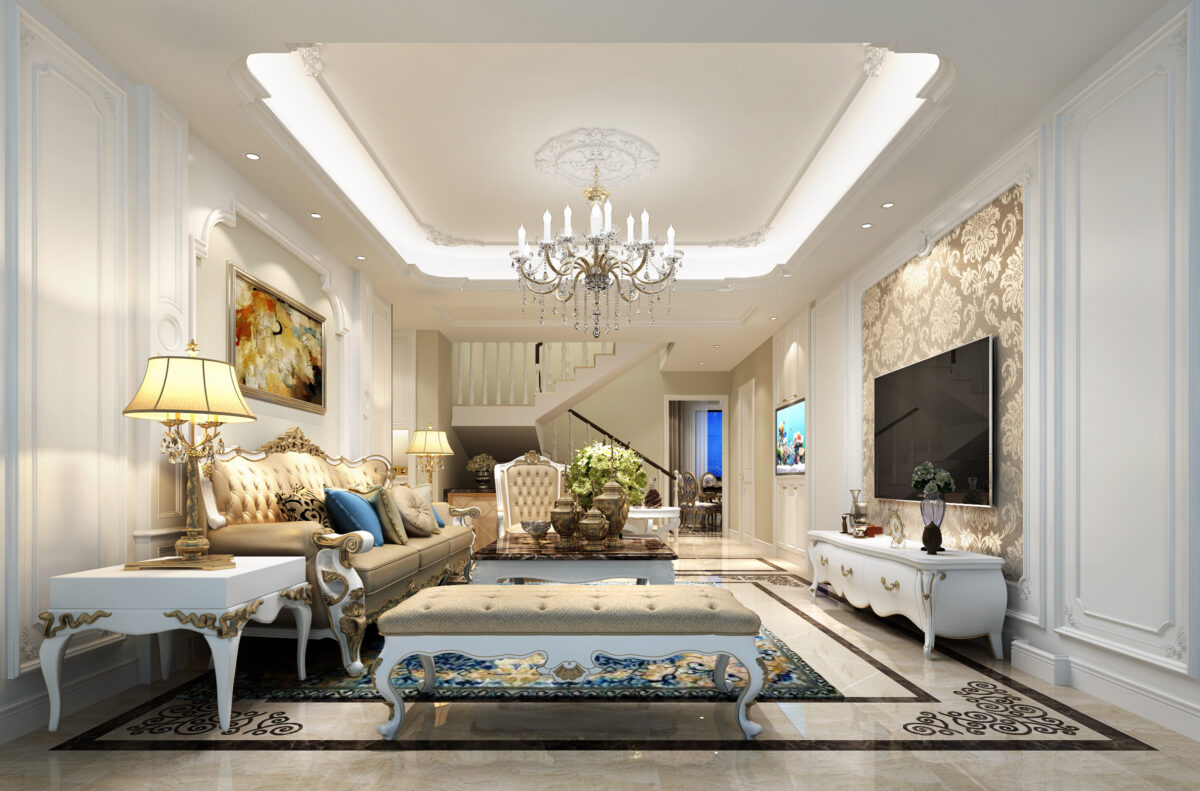 Elegant living room design with white and gold tufted furniture, ornate chandeliers, and intricate wall paneling.