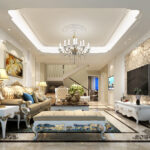 Elegant living room design with white and gold tufted furniture, ornate chandeliers, and intricate wall paneling.
