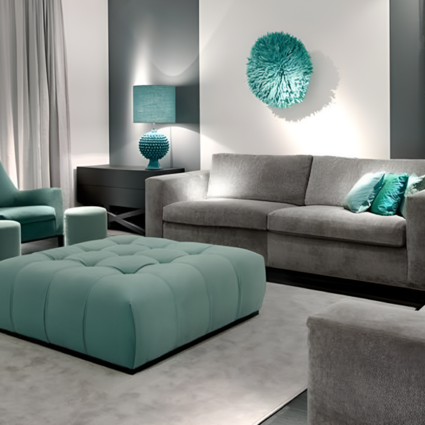 Modern grey sofa set with teal cushions, perfect for contemporary home decor.