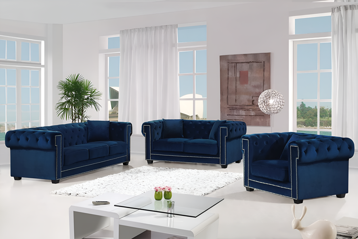 Luxurious navy blue tufted velvet sofa set with nailhead trim, featuring a 3-seater, 2-seater, and armchair.