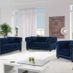 Luxurious navy blue tufted velvet sofa set with nailhead trim, featuring a 3-seater, 2-seater, and armchair.