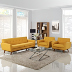 Sunlit Charm Sofa Set with a vibrant mango color, featuring 3+1+1 seating in a contemporary living room