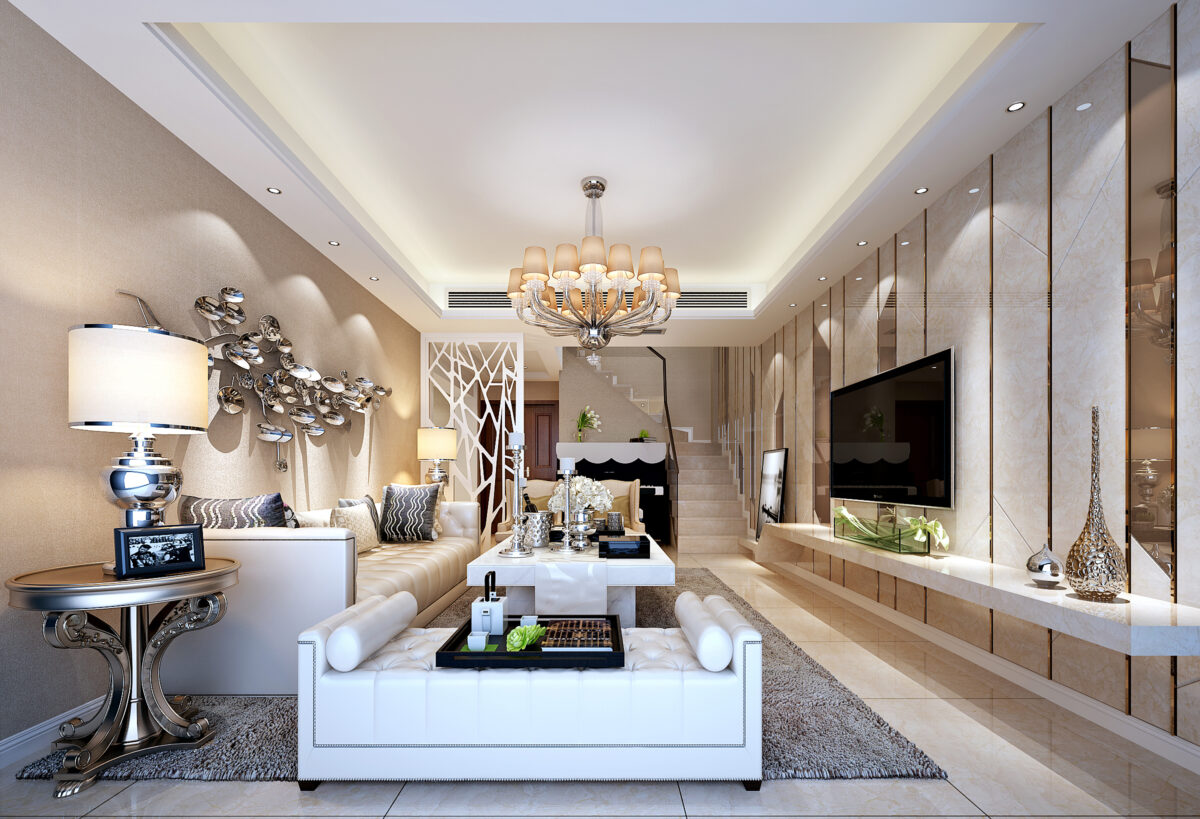 Contemporary living room featuring metallic wall art, a plush white tufted sofa, mirror-paneled walls, and a modern chandelier.