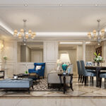 Elegant living and dining room with white paneling, marble flooring, blue accents, and a central chandelier