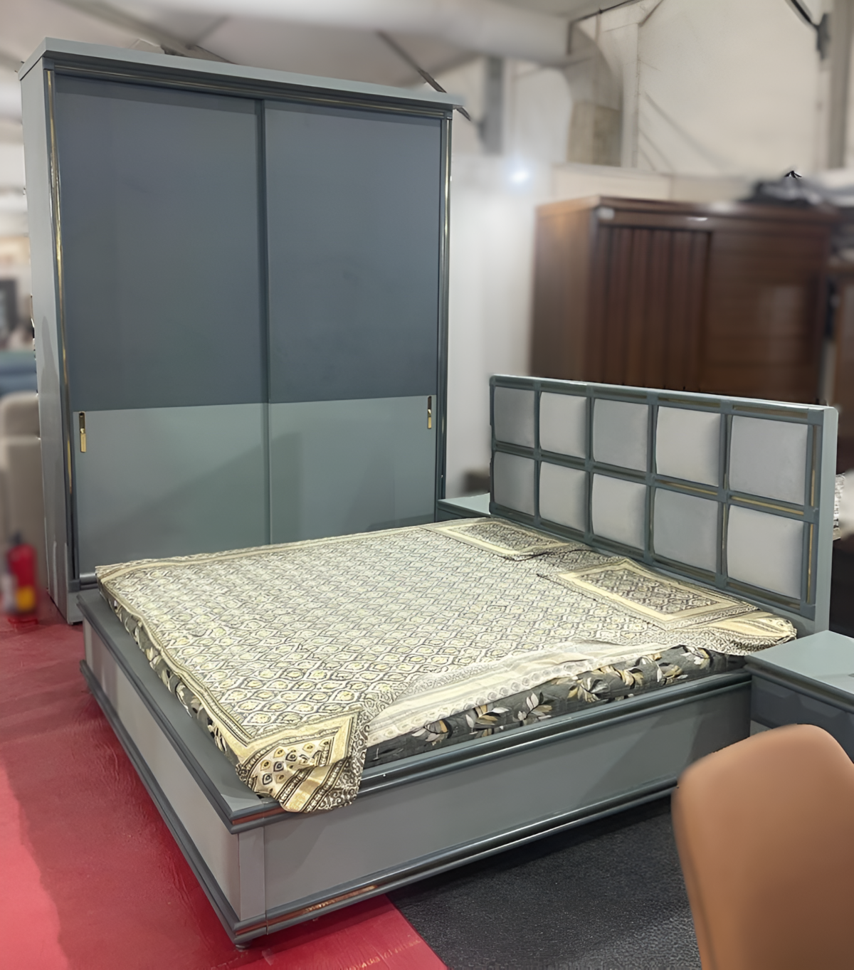Turkey model bedroom set featuring a cushioned headboard, modern sliding wardrobe, and matching nightstands.