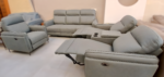 Modern recliner sofa set with plush upholstery, cup holders, and ergonomic design for a stylish and comfortable living room setup.