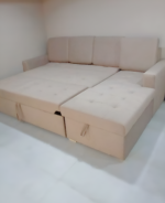 L-shape sofa cum bed with storage, plush upholstery, and modern design for compact living spaces